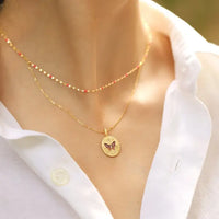 Butterfly coin necklace