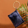 Navy woven luxe gold handle wristlet